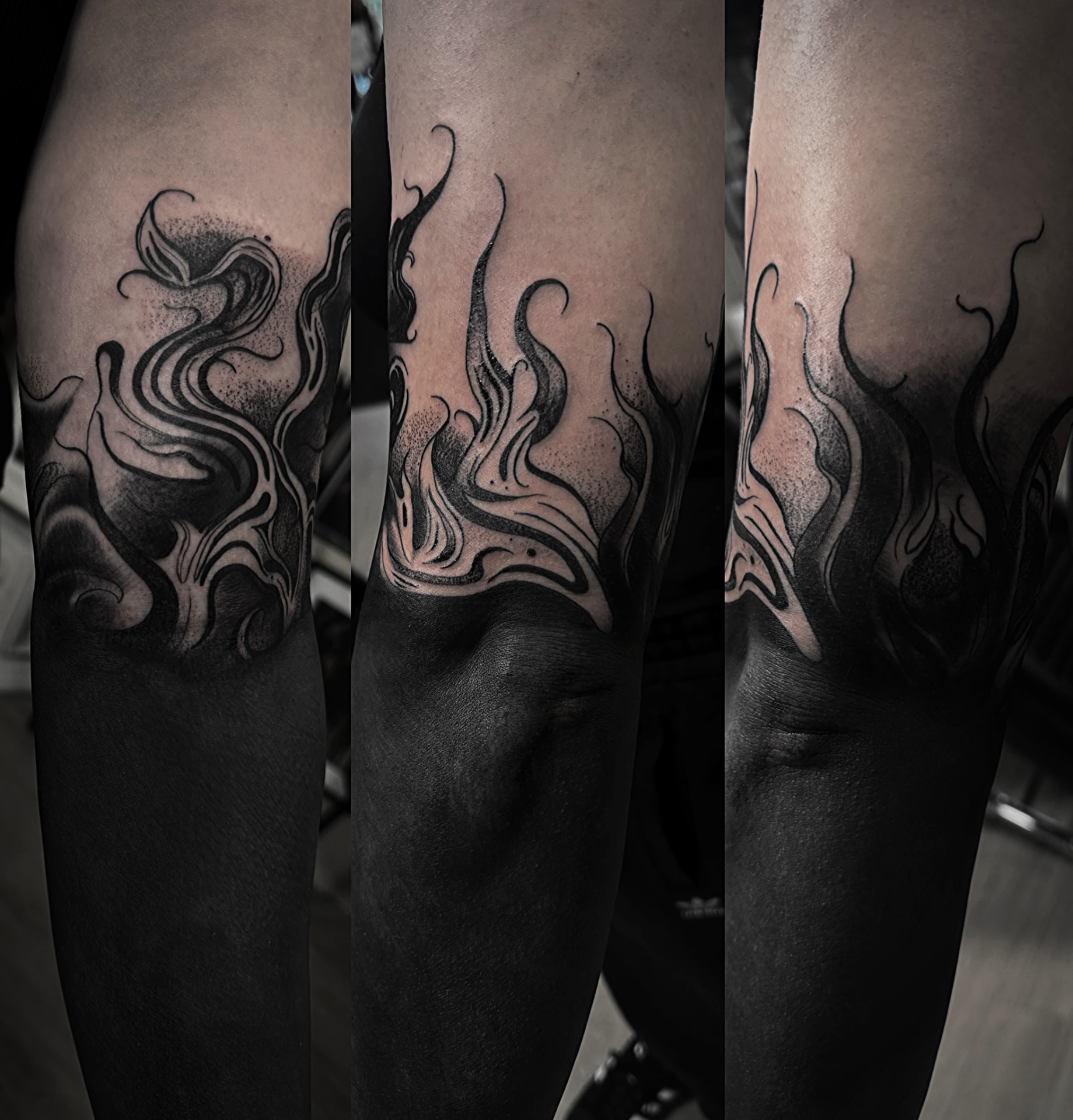 Stylized flames and smoke rising from a solid blackout sleeve