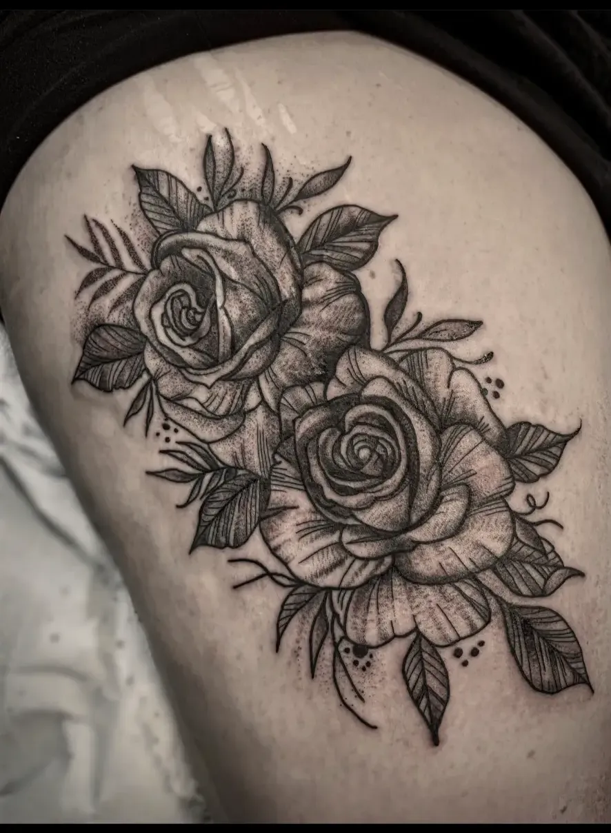 Dotwork roses and leaves thigh piece in soft black and grey